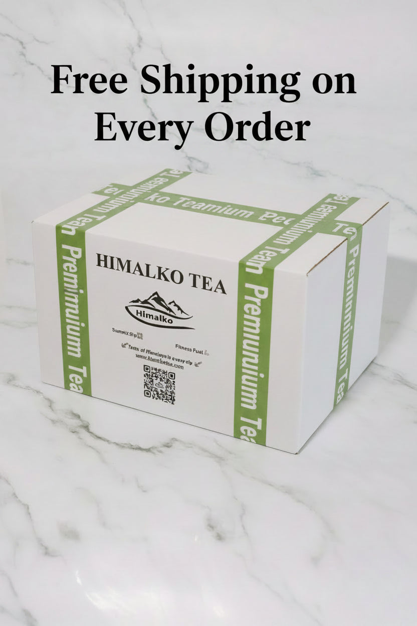 A white cardboard box of Himalko Tea with green accents and black text, placed on a white marble surface.