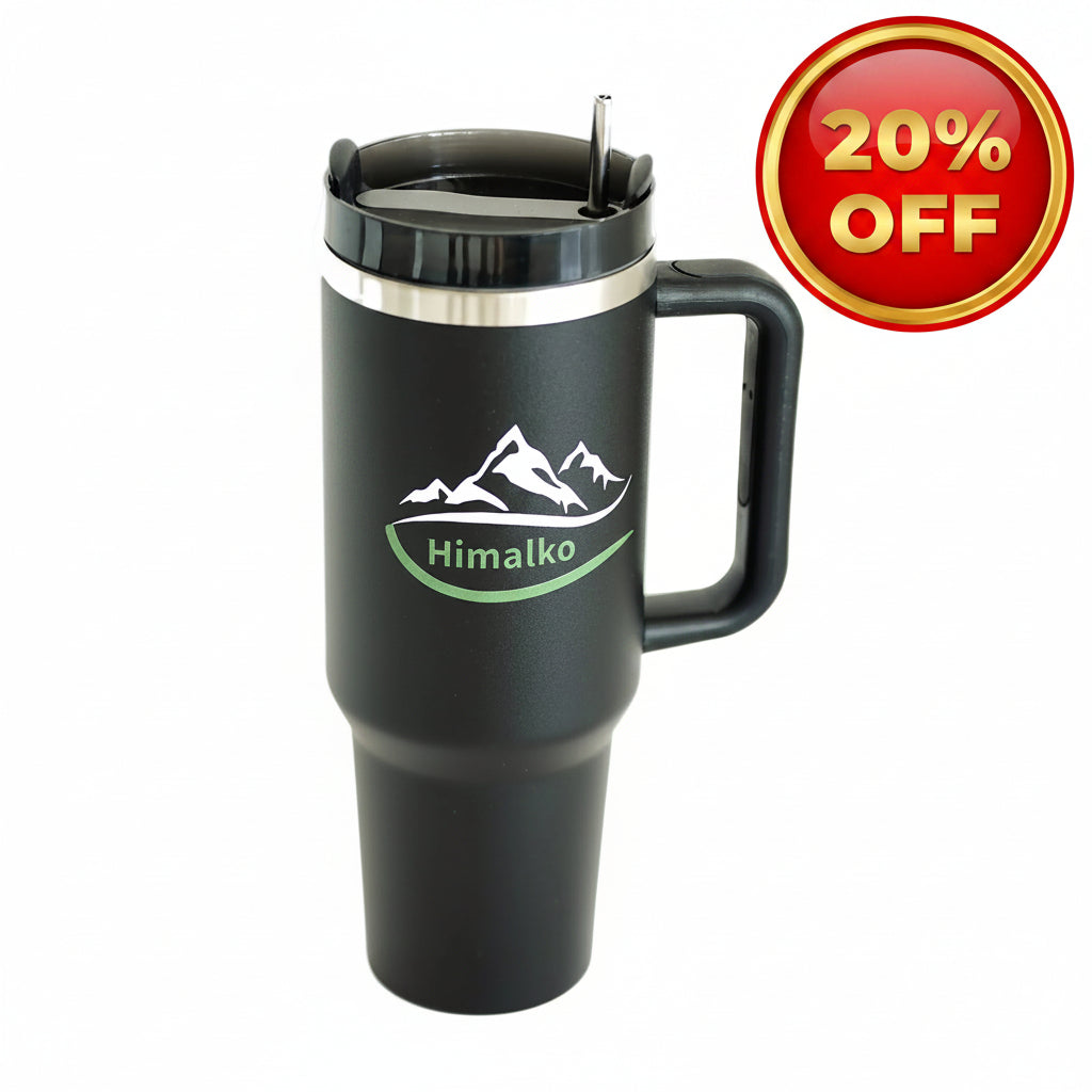 A black insulated travel tumbler with a handle, lid, and straw, featuring a white mountain graphic and the word 'Himalko' in green on the front, shown on a plain white background.